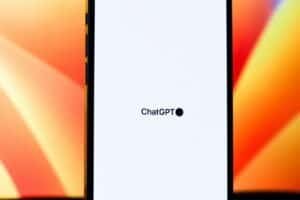 Smartphone displaying an AI chatbot interface with the ChatGPT logo on screen