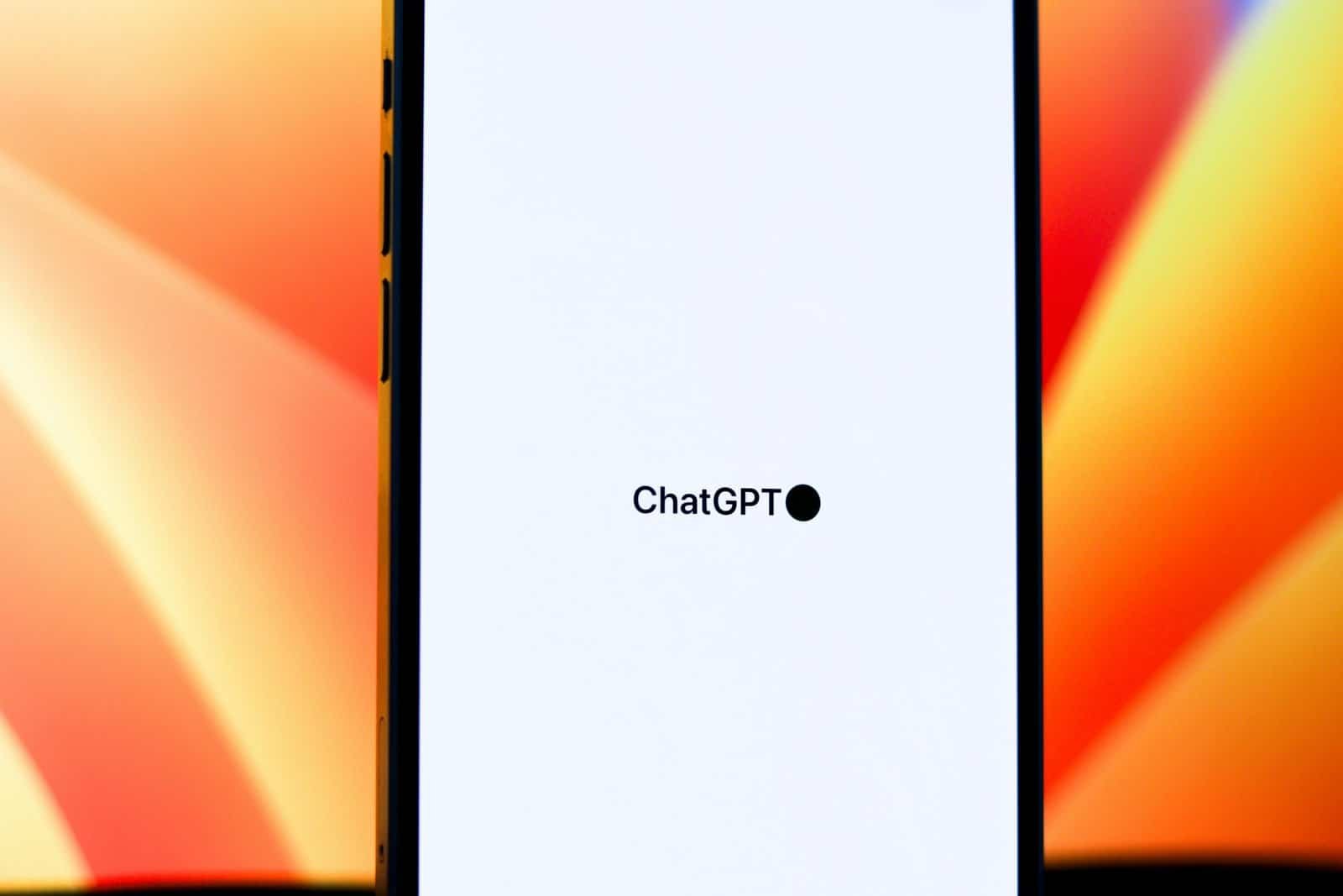 Smartphone displaying an AI chatbot interface with the ChatGPT logo on screen
