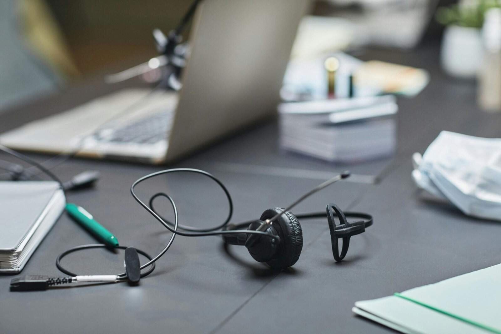 Customer support headset on a desk representing AI voice agents and automated call handling for businesses