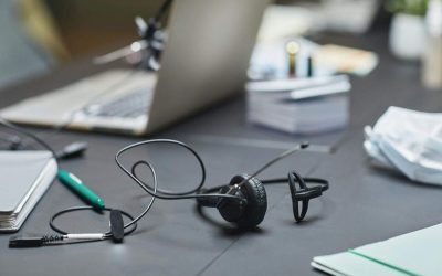 Customer support headset on a desk representing AI voice agents and automated call handling for businesses